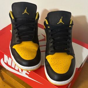 Nike Black and University Gold/ Air Jordan 1 Low